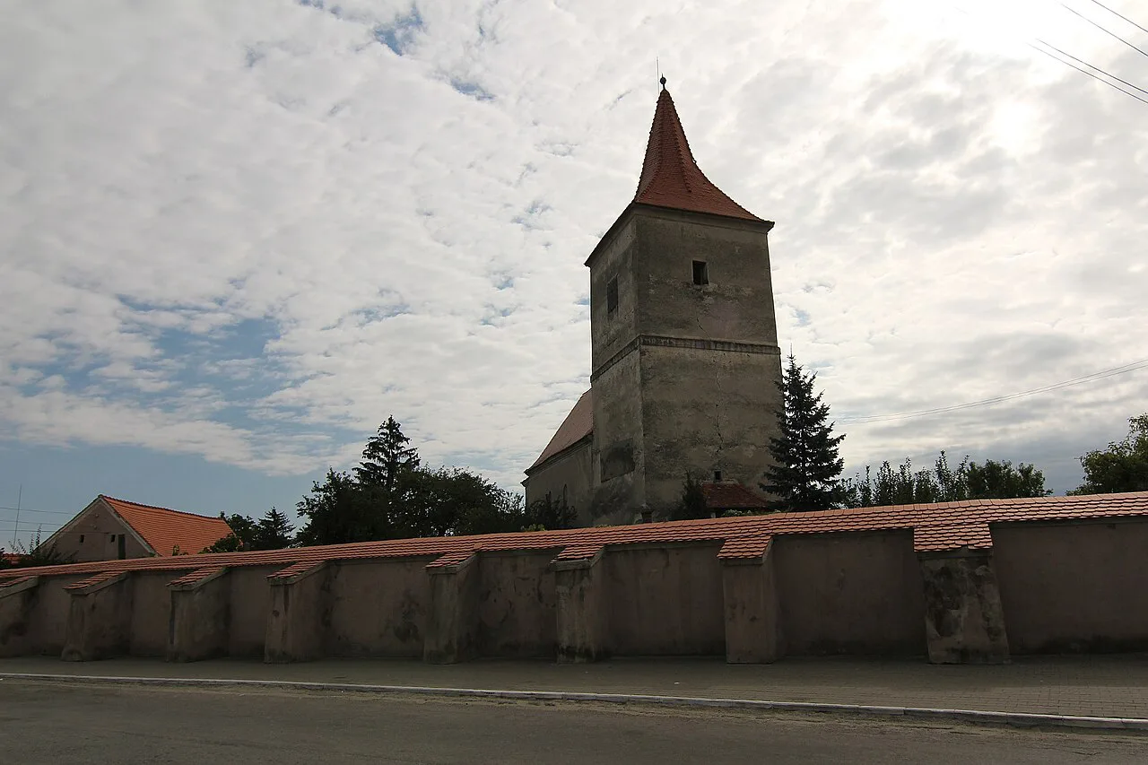 The fortified Evangelical church in Avrig behind its defensive wall.