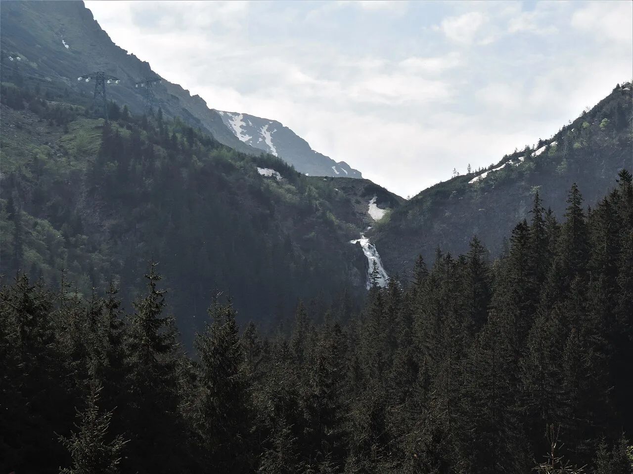 Bâlea Waterfall in its glacial valley in the Făgăraș Mountains.