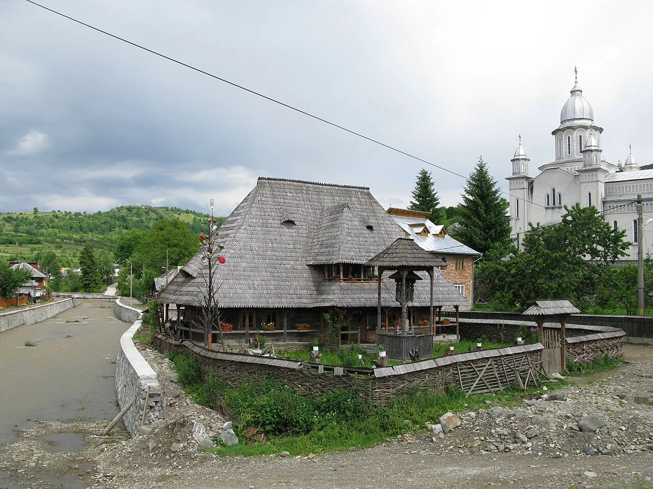 Rectory and church in Botiza.