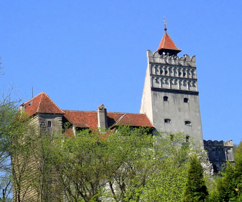 The tower and red roofs of Bran Castle.
