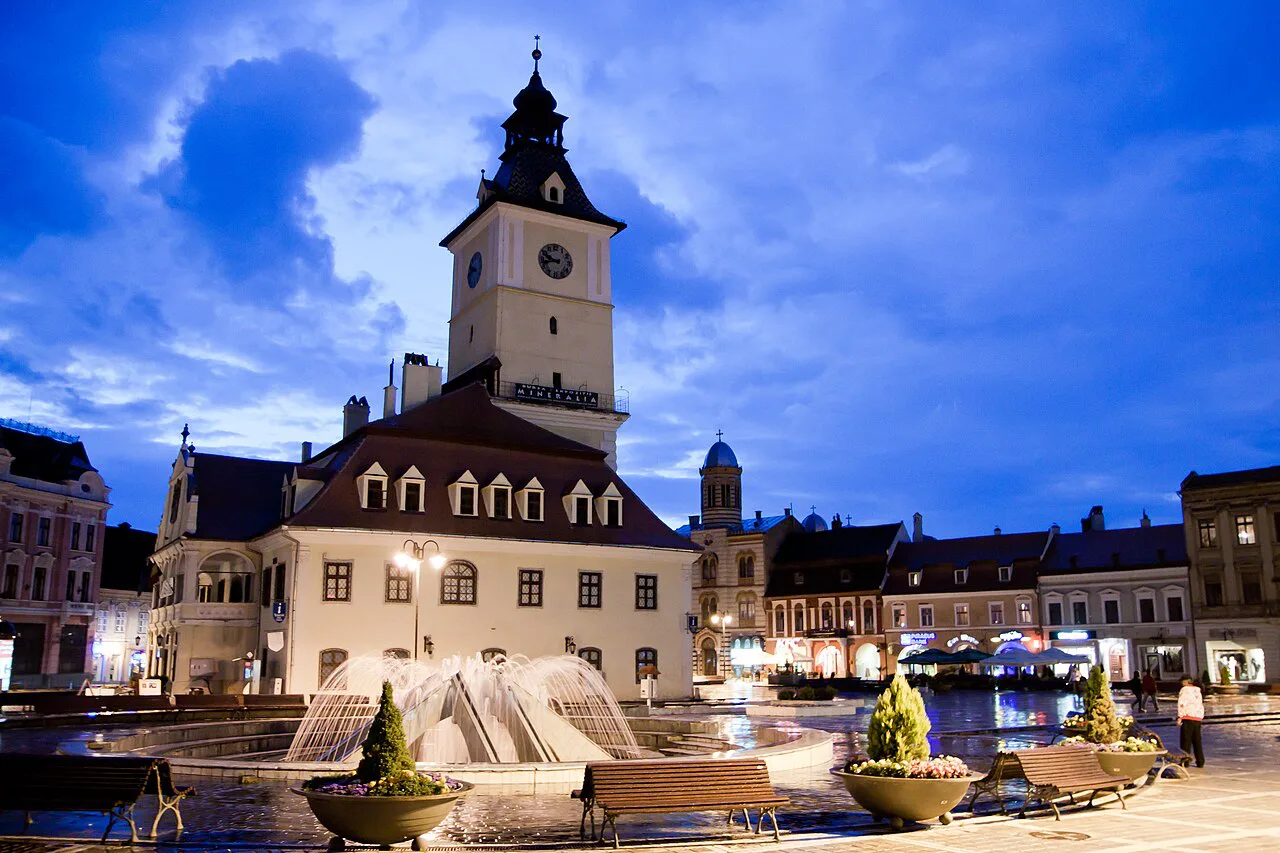 Piața Sfatului and the Council House at dusk, Brașov.