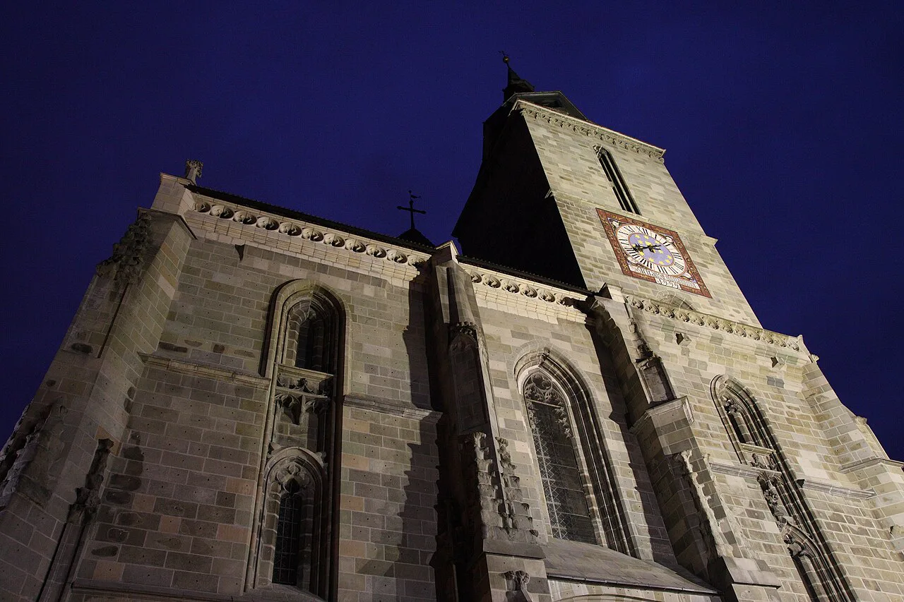 The Gothic walls and tower of the Black Church at dusk, Brașov.