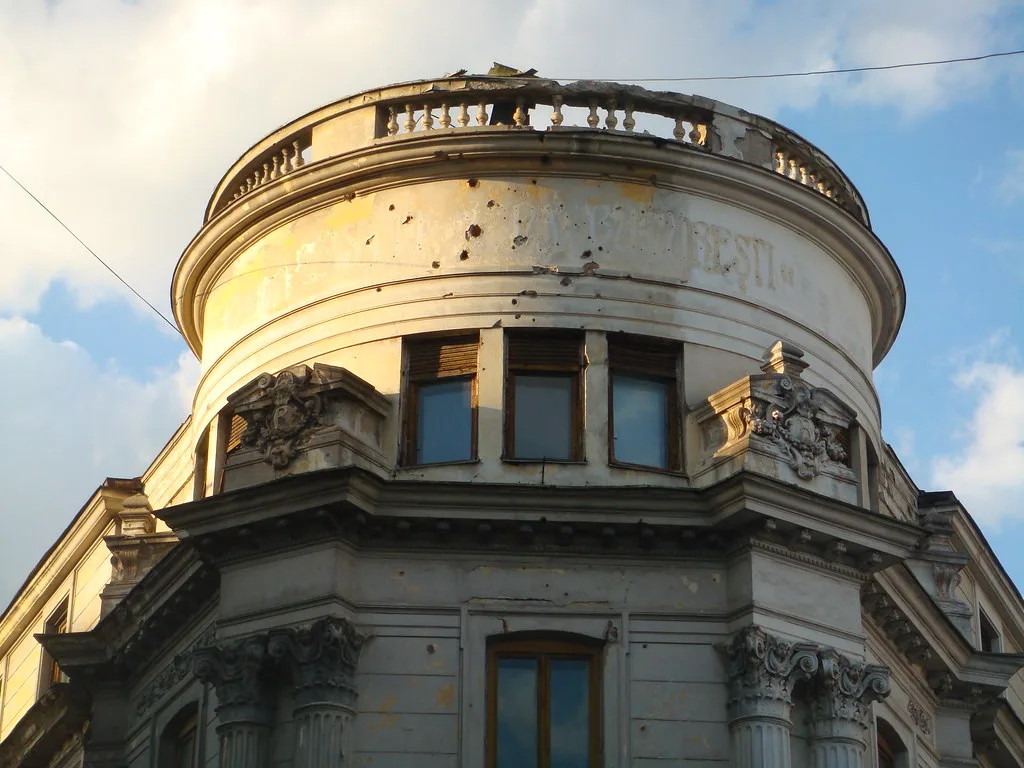 A domed corner building in central Bucharest.