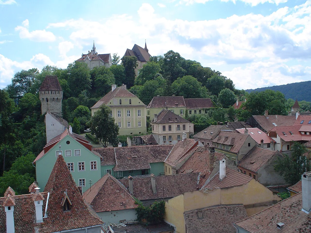Sighișoara's rooftops from the Clock Tower, with the Church on the Hill above.