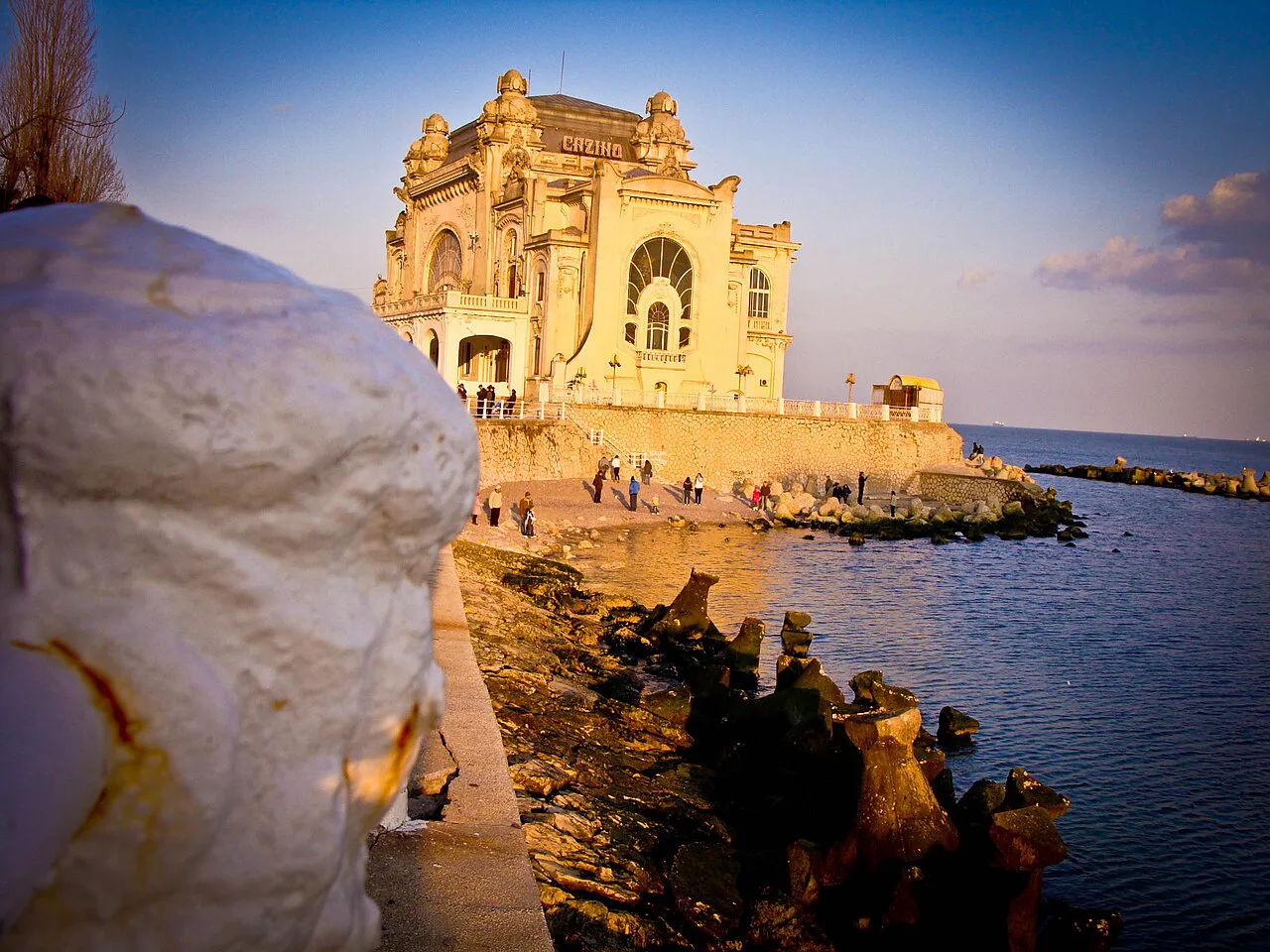 The Constanța Casino and seafront at sunset.