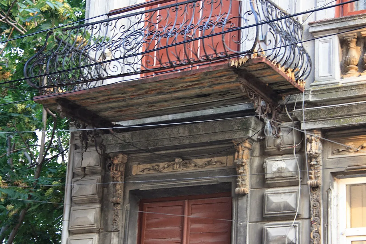 Ornate balconied house façade in Constanța's old town.