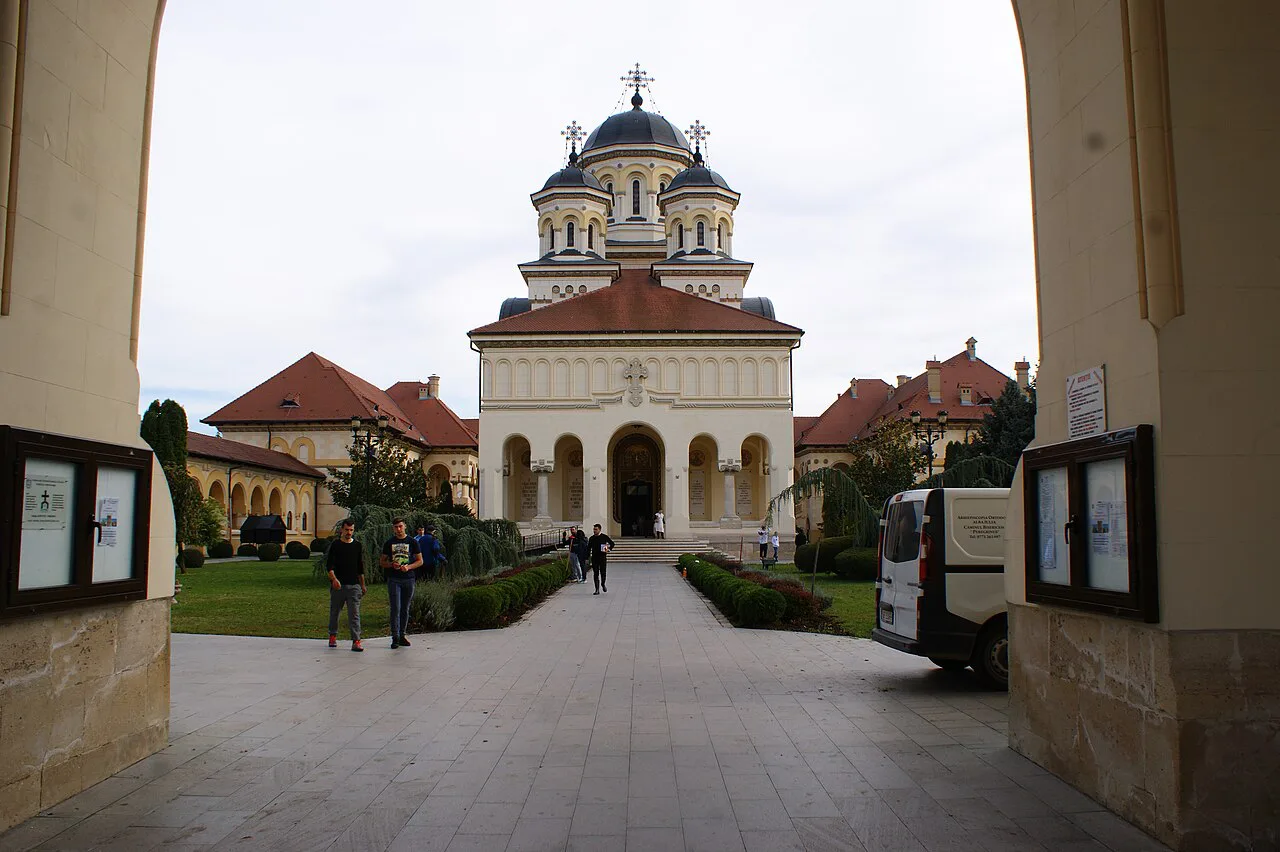 The Coronation Cathedral in Alba Iulia, seen through the gate of its enclosure.