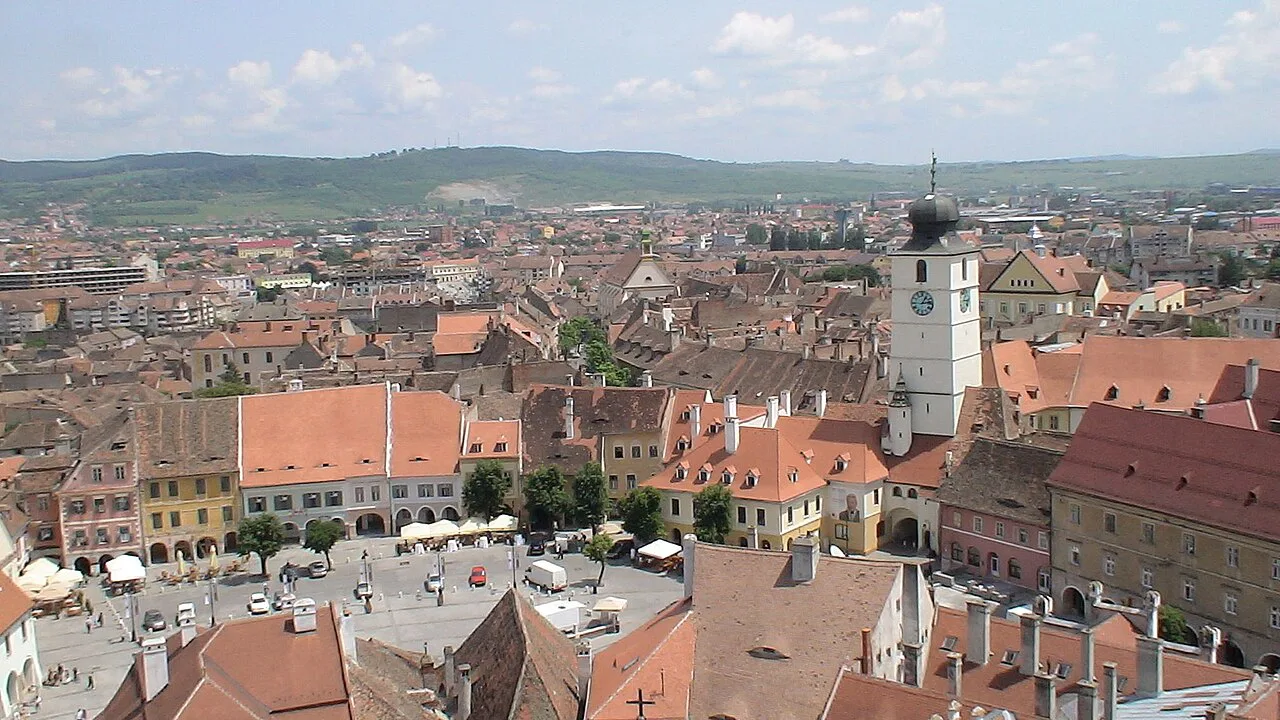 The Council Tower above Sibiu's rooftops, seen from the Evangelical Cathedral tower.