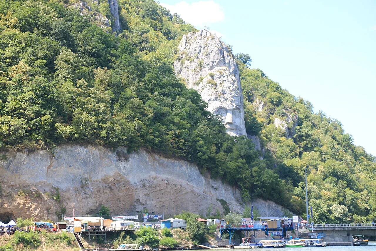 The Rock Sculpture of Decebalus seen from the Danube shore.