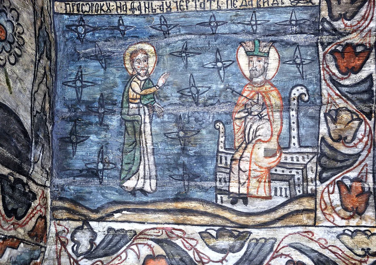 Painted murals inside the wooden church in Desești.