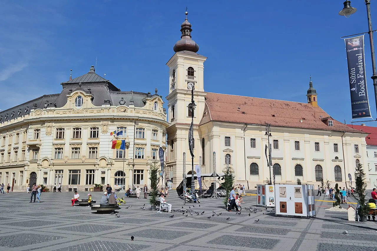Piața Mare in Sibiu with the Brukenthal Palace and Catholic church.