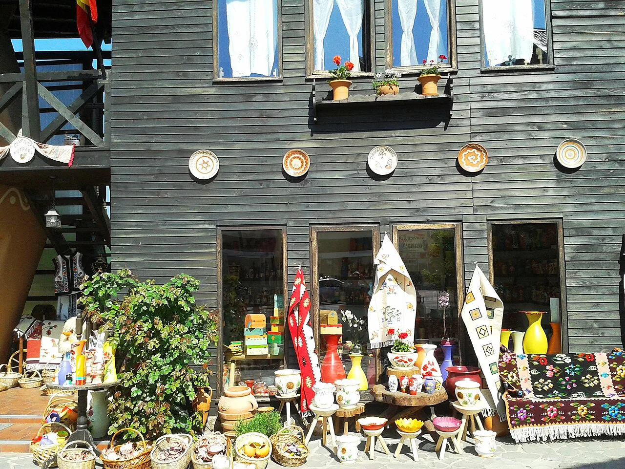 Pottery displayed outside a shop in Horezu.