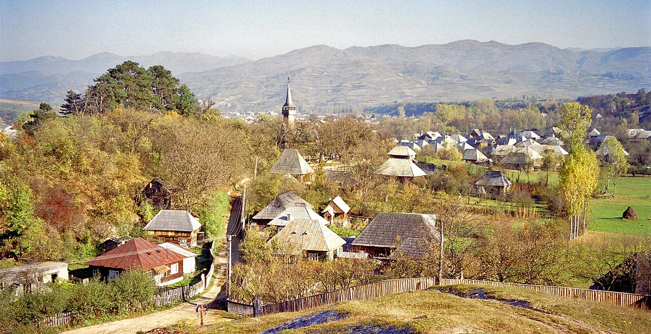 Ieud village and its old wooden church seen from the hill.