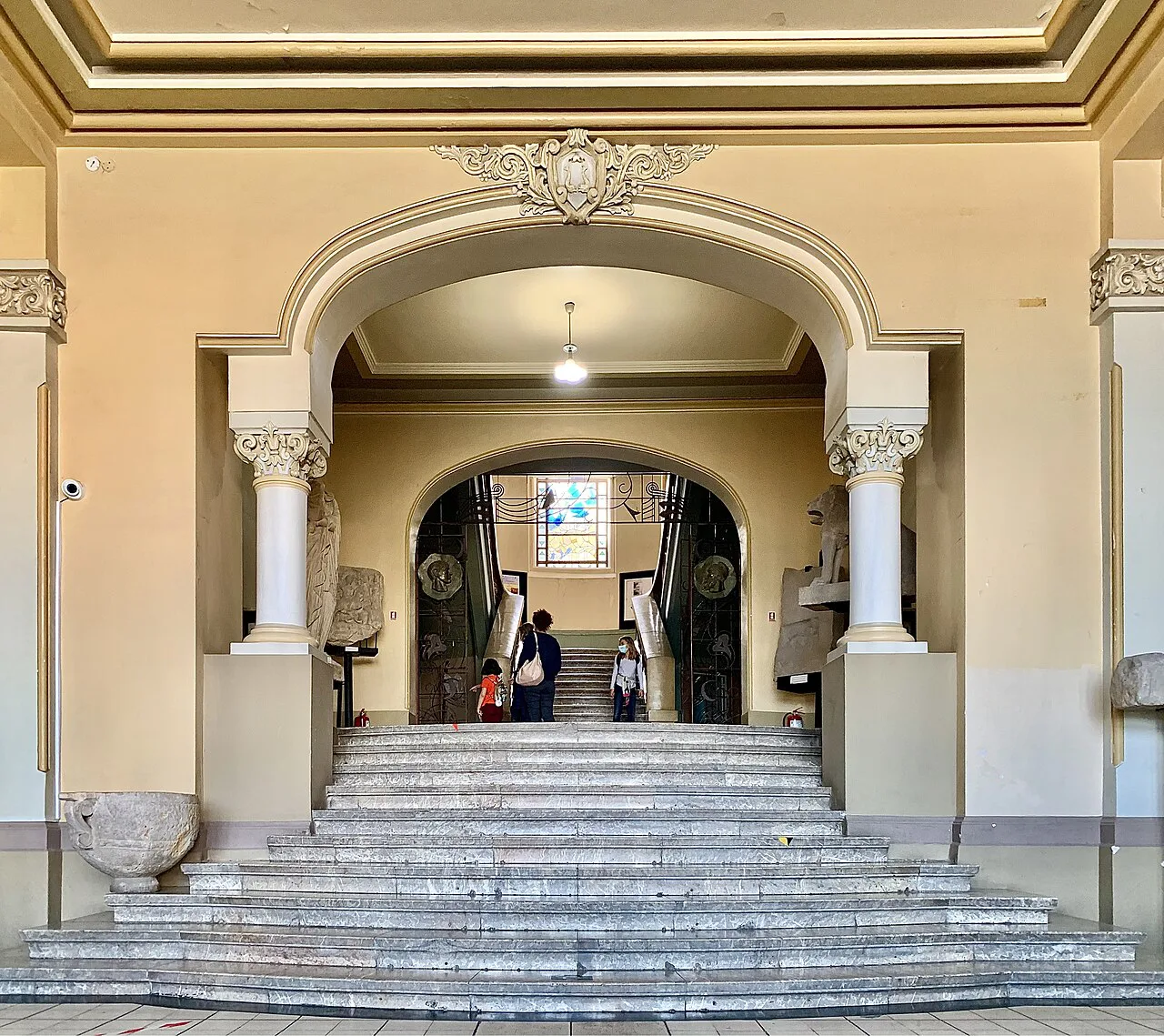 The grand Romanian Revival staircase in the Museum of National History and Archaeology, Constanța.