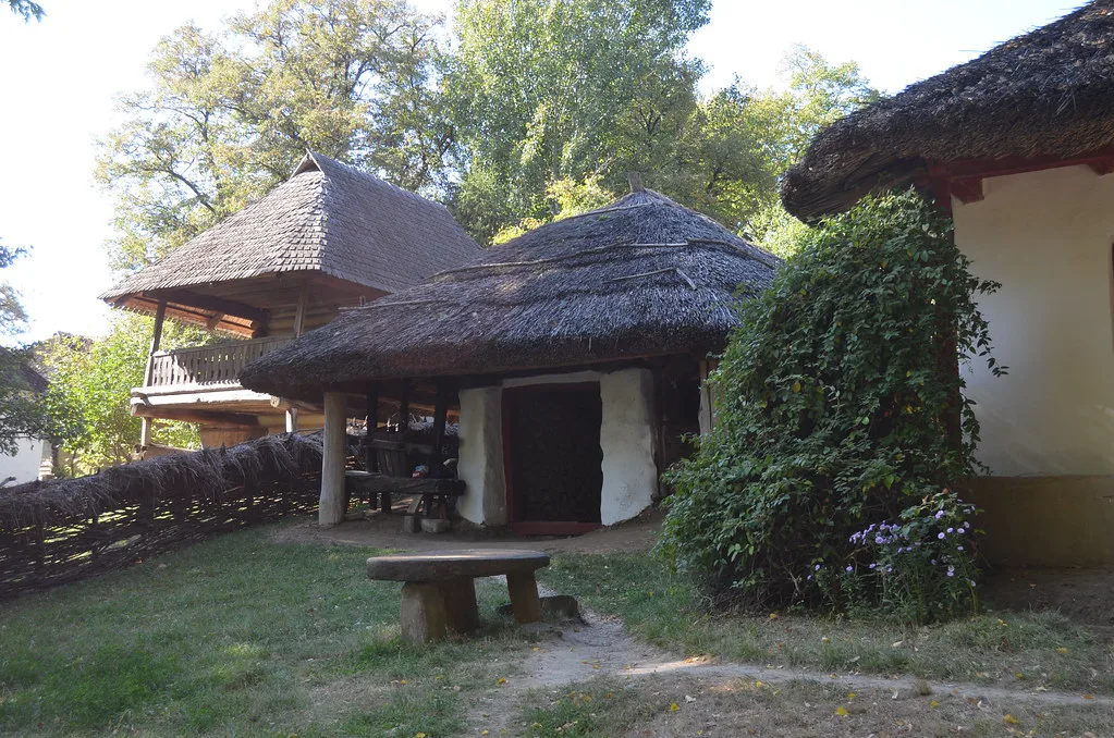 Thatched houses at the Dimitrie Gusti National Village Museum, Bucharest.
