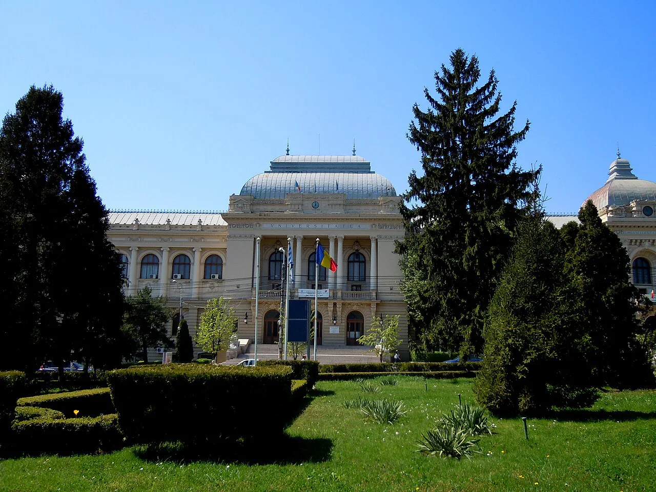 Main building of Alexandru Ioan Cuza University, Iași, and its gardens.