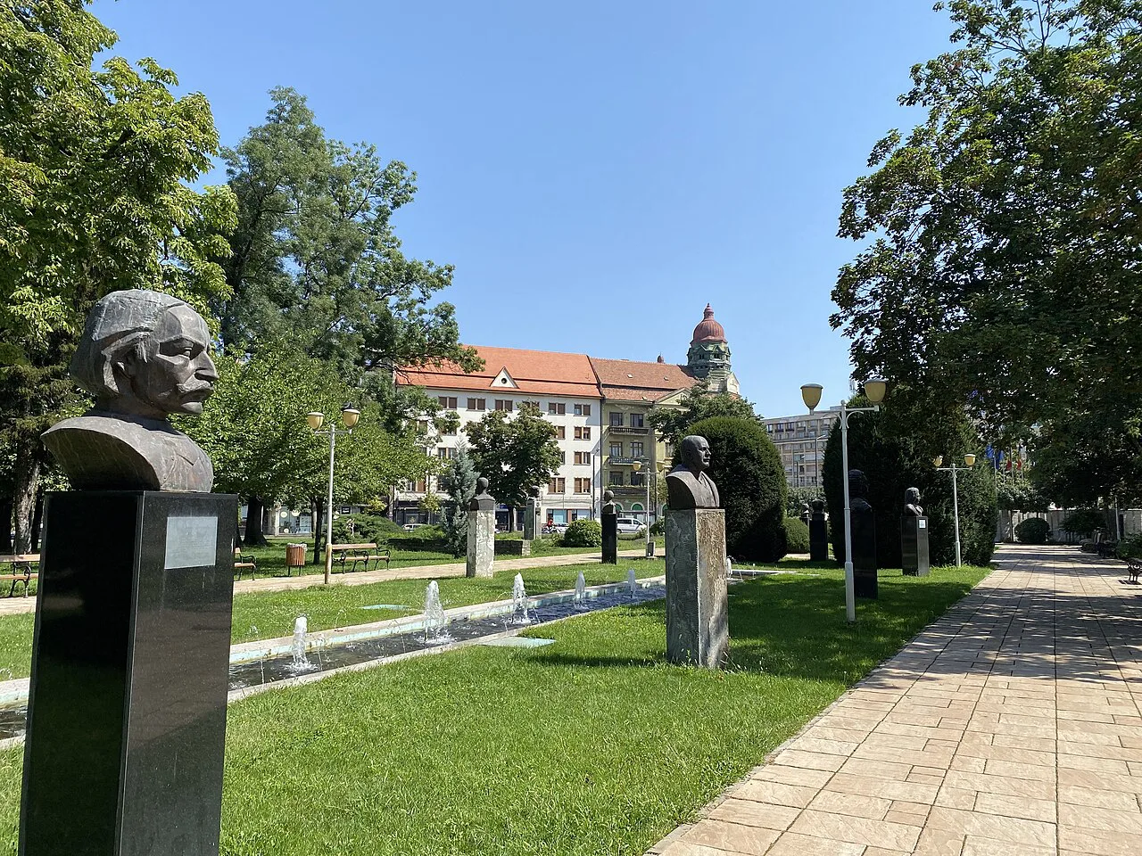 Busts along a path in Parcul Central Anton Scudier (Central Park), Timișoara.