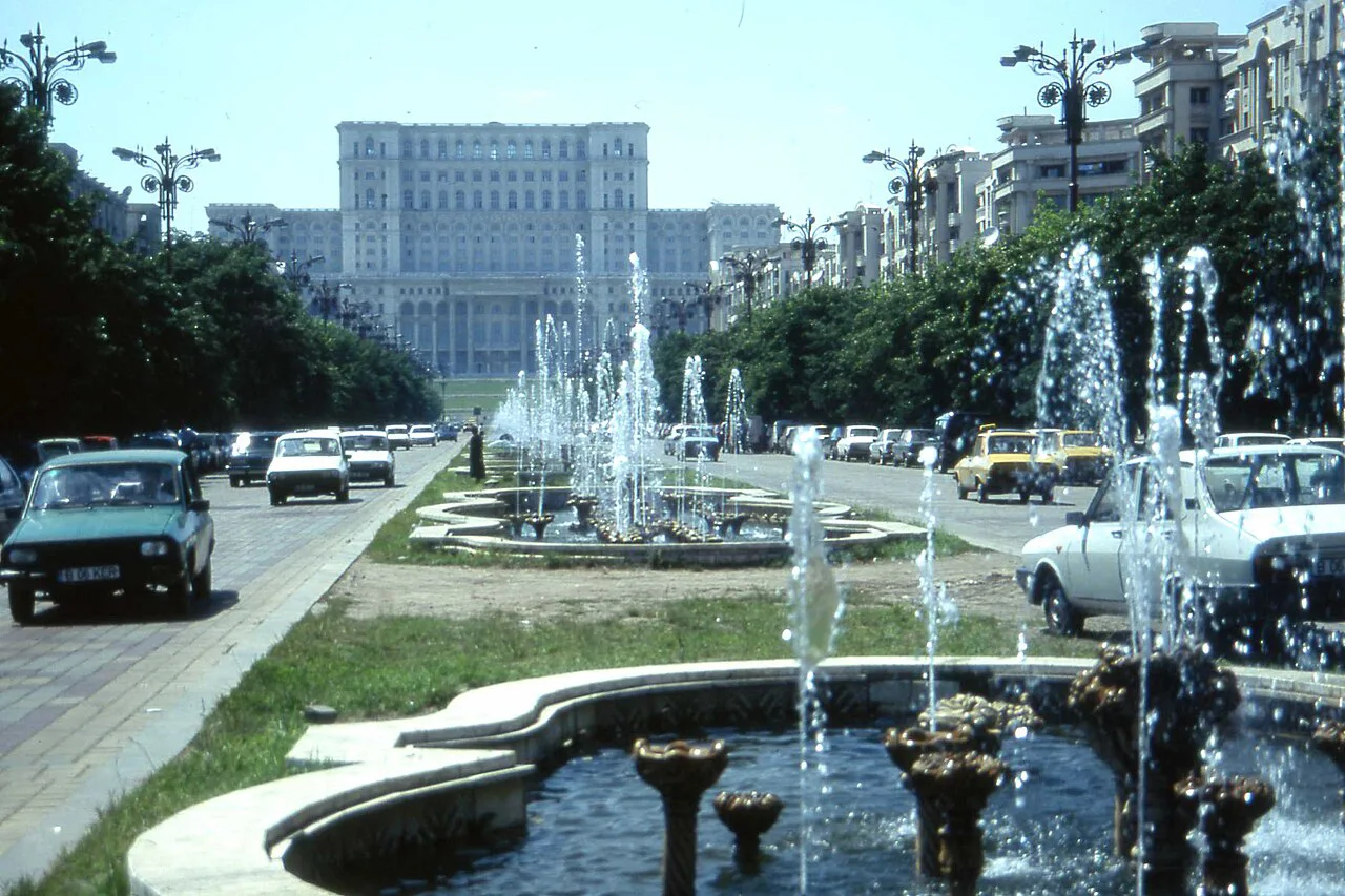 The Palace of the Parliament beyond the fountains of Bulevardul Unirii, Bucharest.