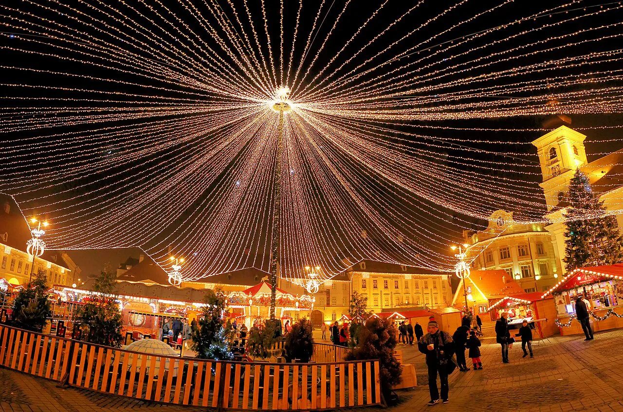Piața Mare in Sibiu lit for the Christmas market.