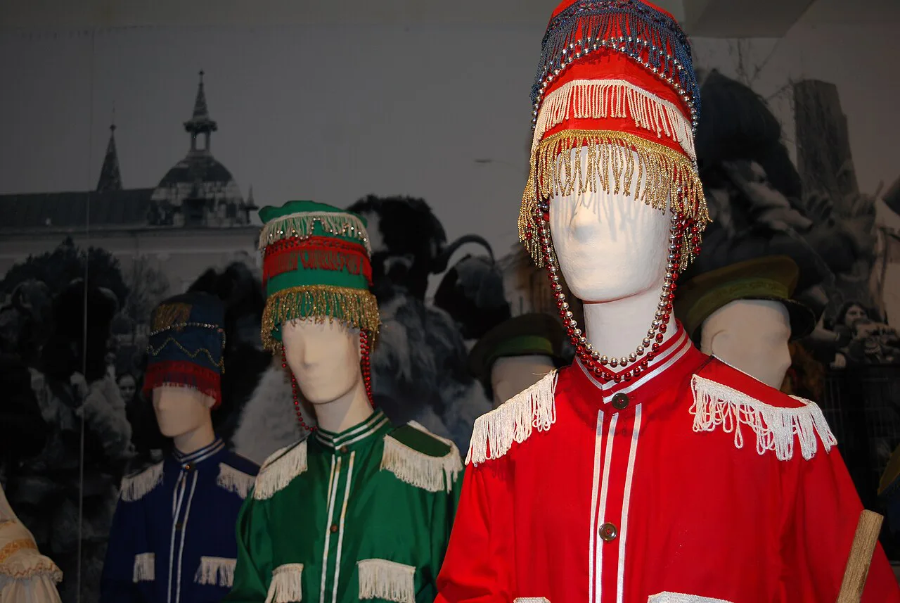 Old military-style carnival costumes at the Maramureș Village Museum.