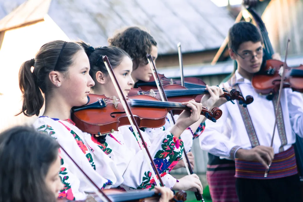Young musicians in Romanian folk costume, Faraoani.