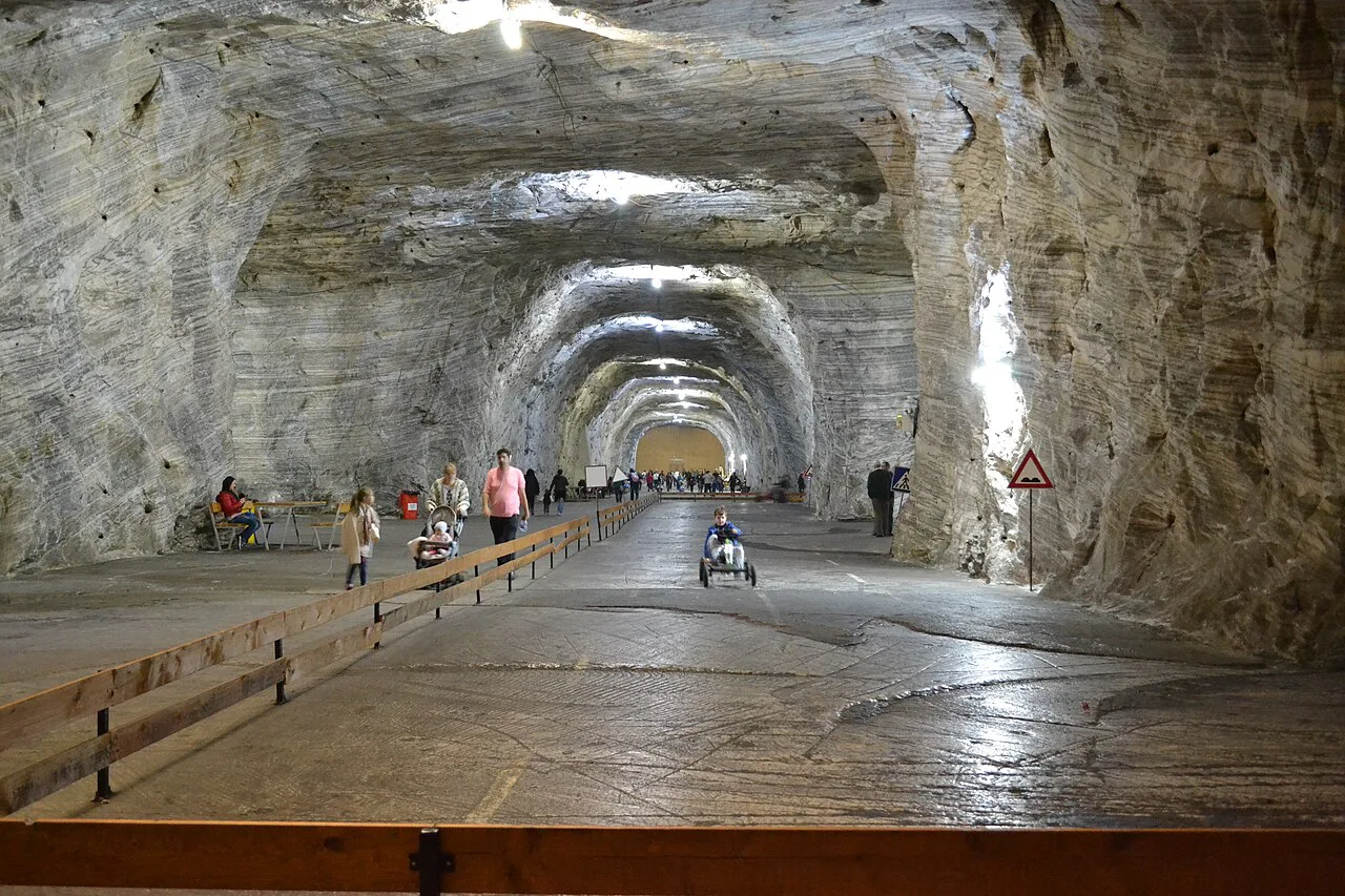 Visitors in the underground hall of Salina Târgu Ocna.