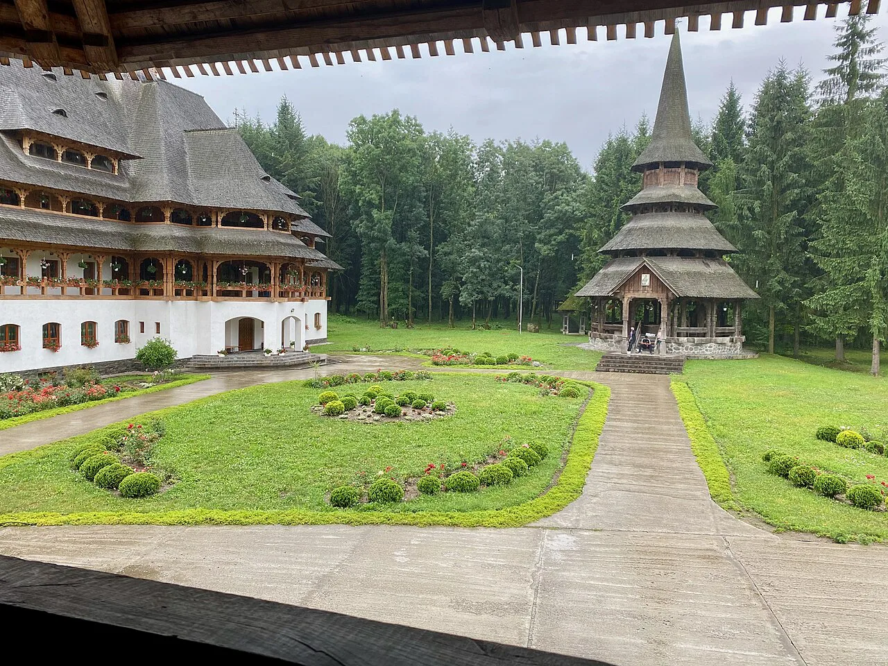 The gardens and wooden church of Săpânța-Peri Monastery.