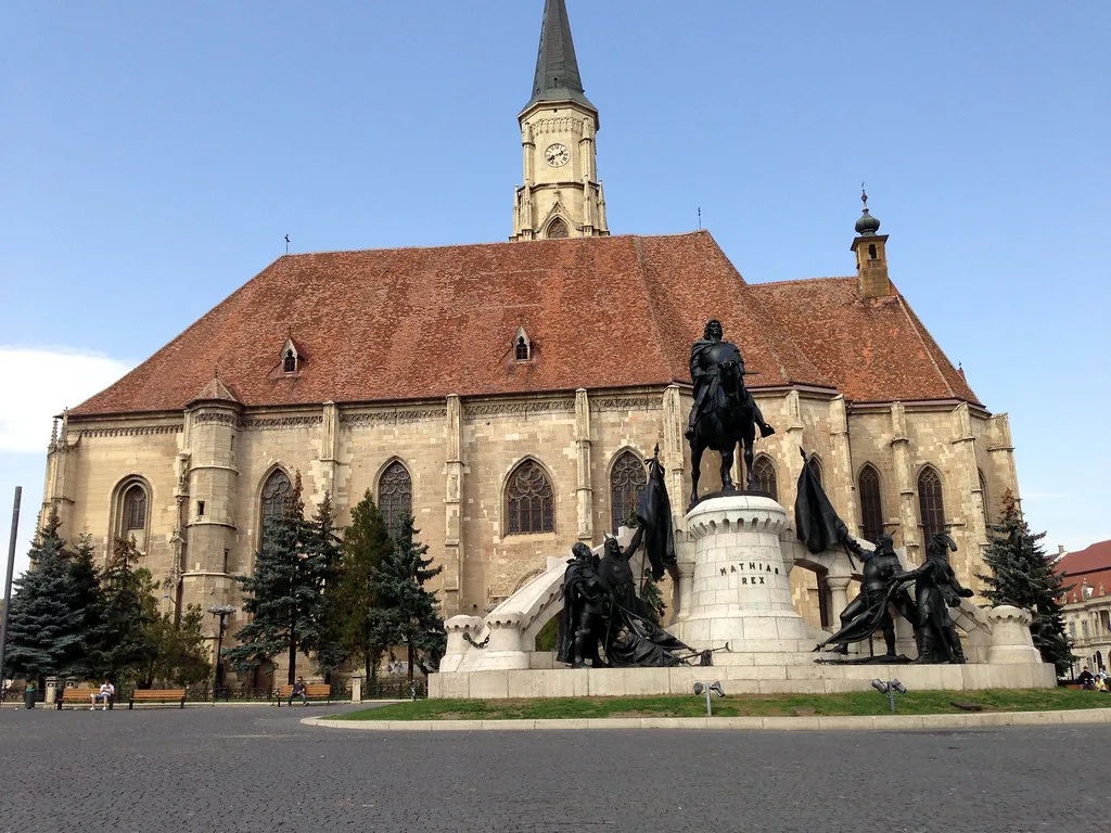The Matthias Corvinus monument and St Michael's Church in Cluj-Napoca.