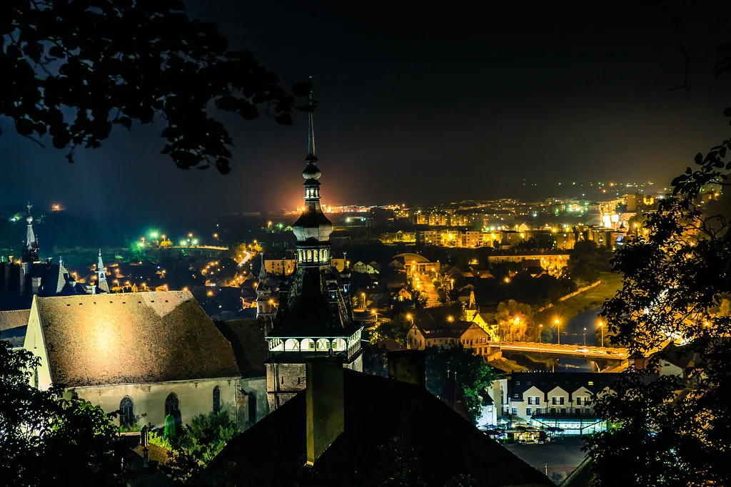 Sighișoara lit up at night.