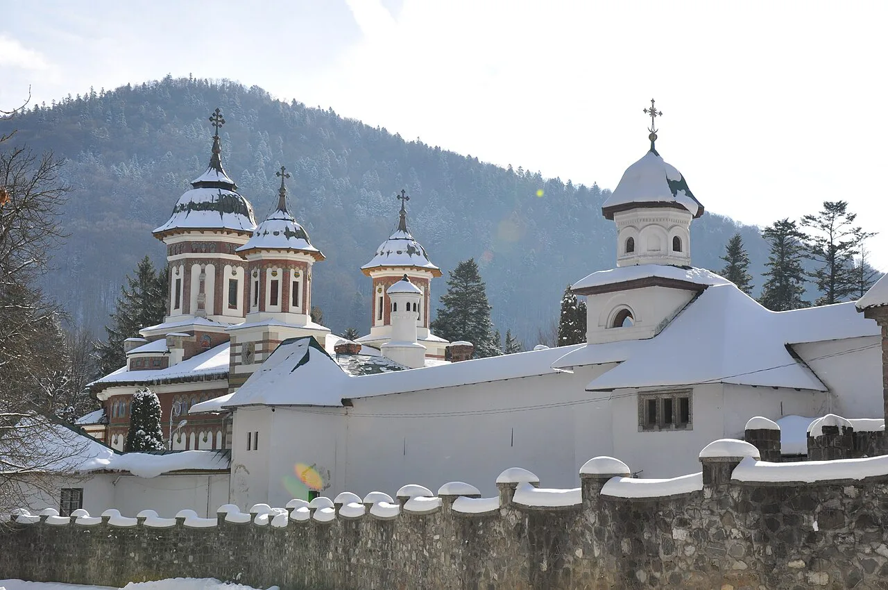 Sinaia Monastery under winter snow.