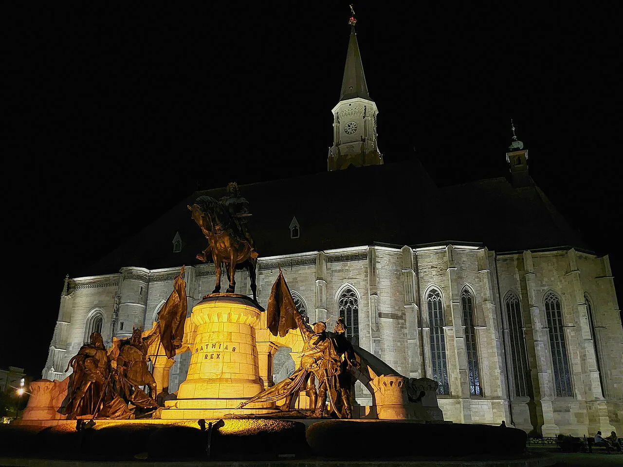 St Michael's Church and the Matthias Corvinus Monument at night, Cluj-Napoca.