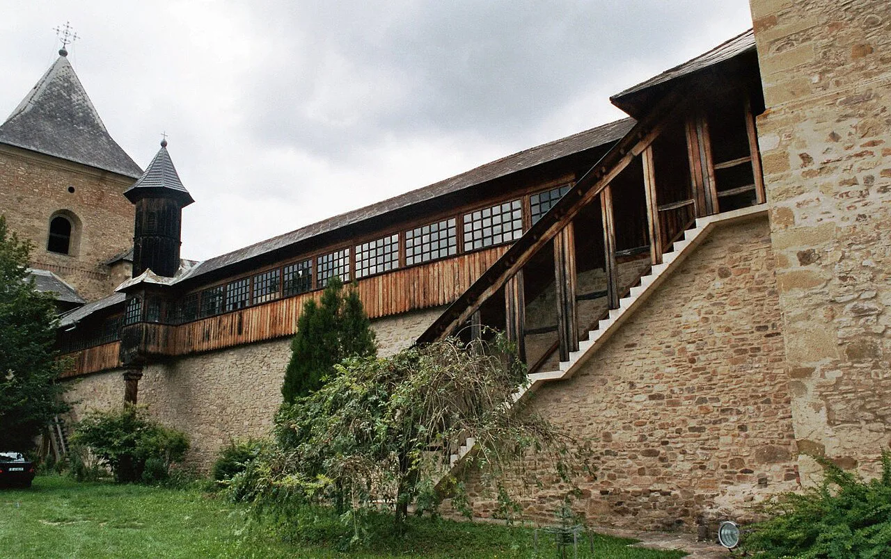 Walls and wooden gallery of Sucevița Monastery.