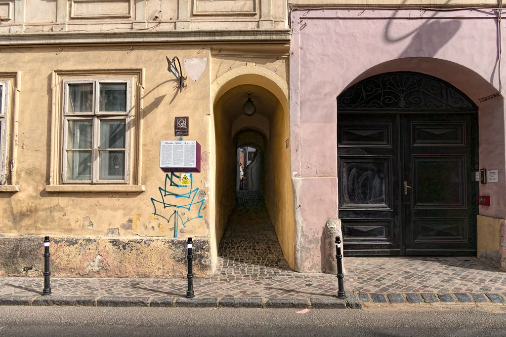 Entrance to Strada Sforii (Rope Street), Brașov.