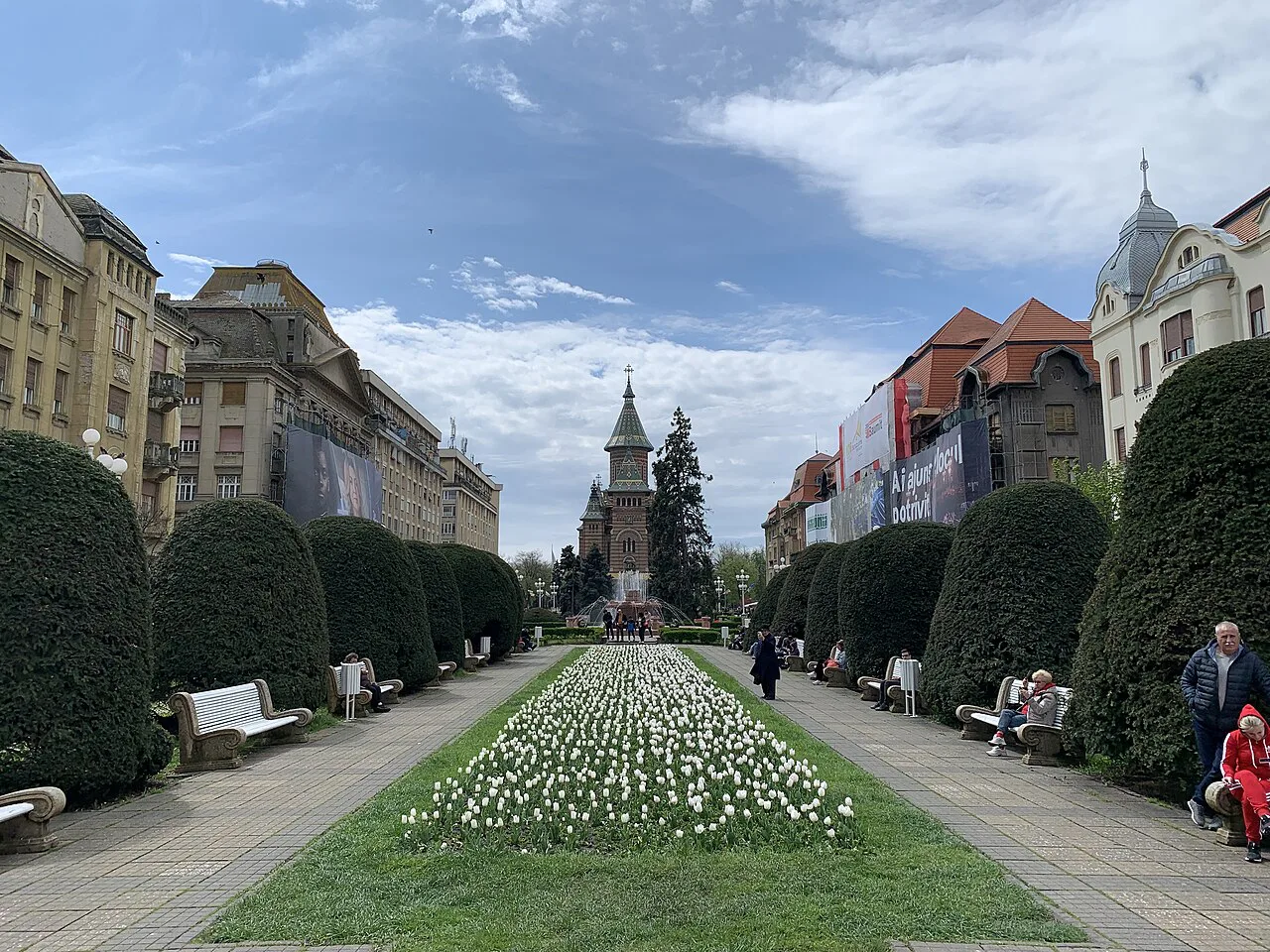 The gardens of Piața Victoriei with the Metropolitan Cathedral beyond, Timișoara.