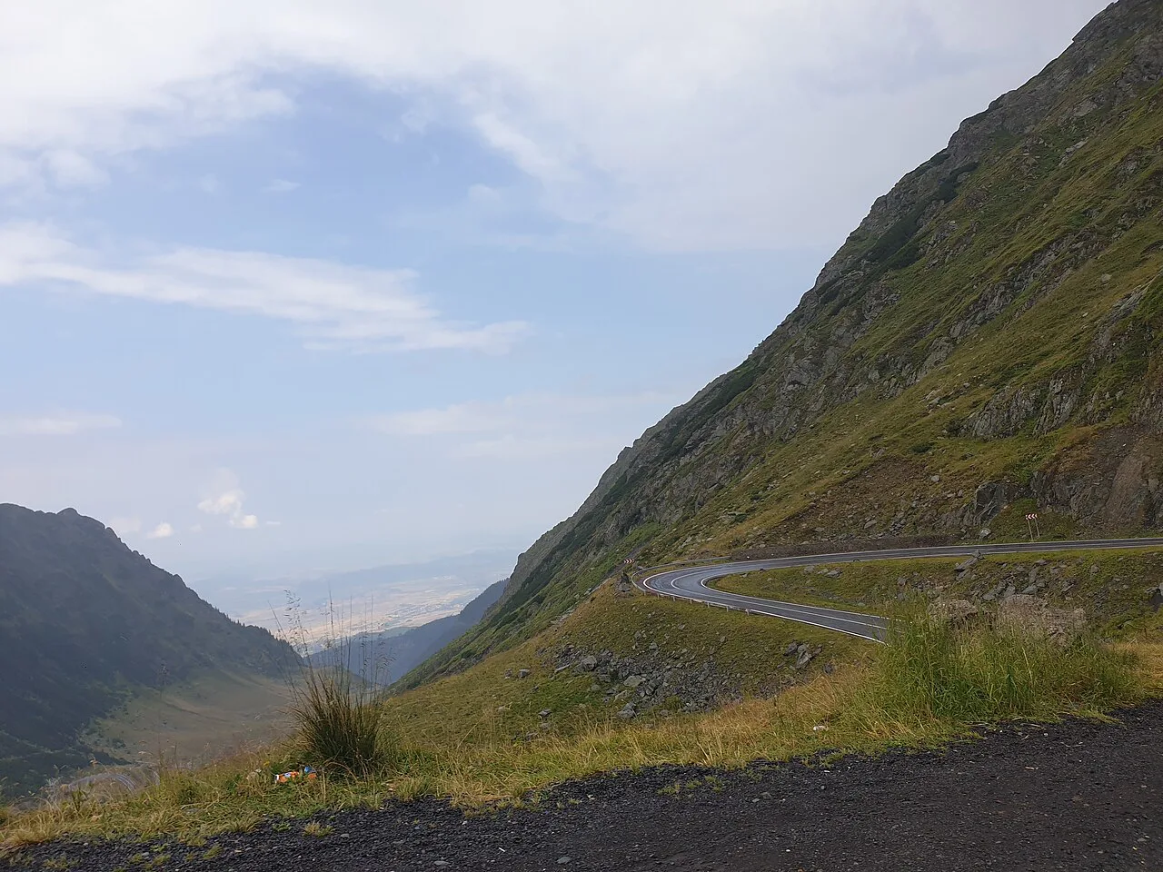 The Transfăgărășan road climbing a mountain slope.