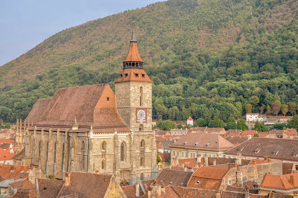 The Black Church (Biserica Neagră) rising above the rooftops of Brașov.