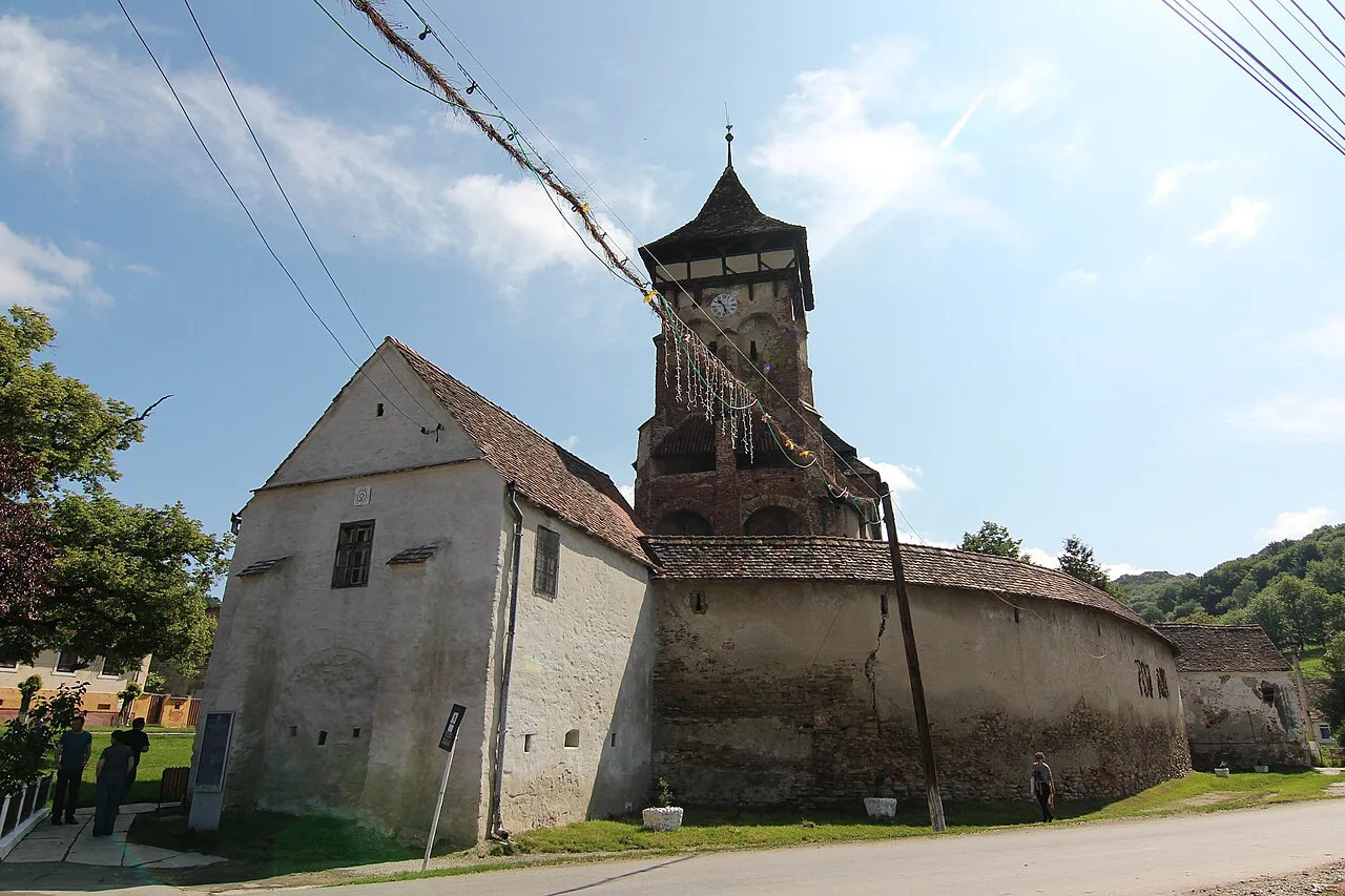 The fortified church tower and nave in Valea Viilor.