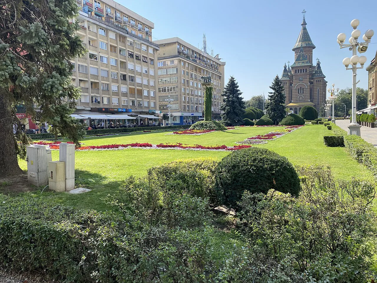 Gardens on Piața Victoriei with the Metropolitan Cathedral beyond, Timișoara.
