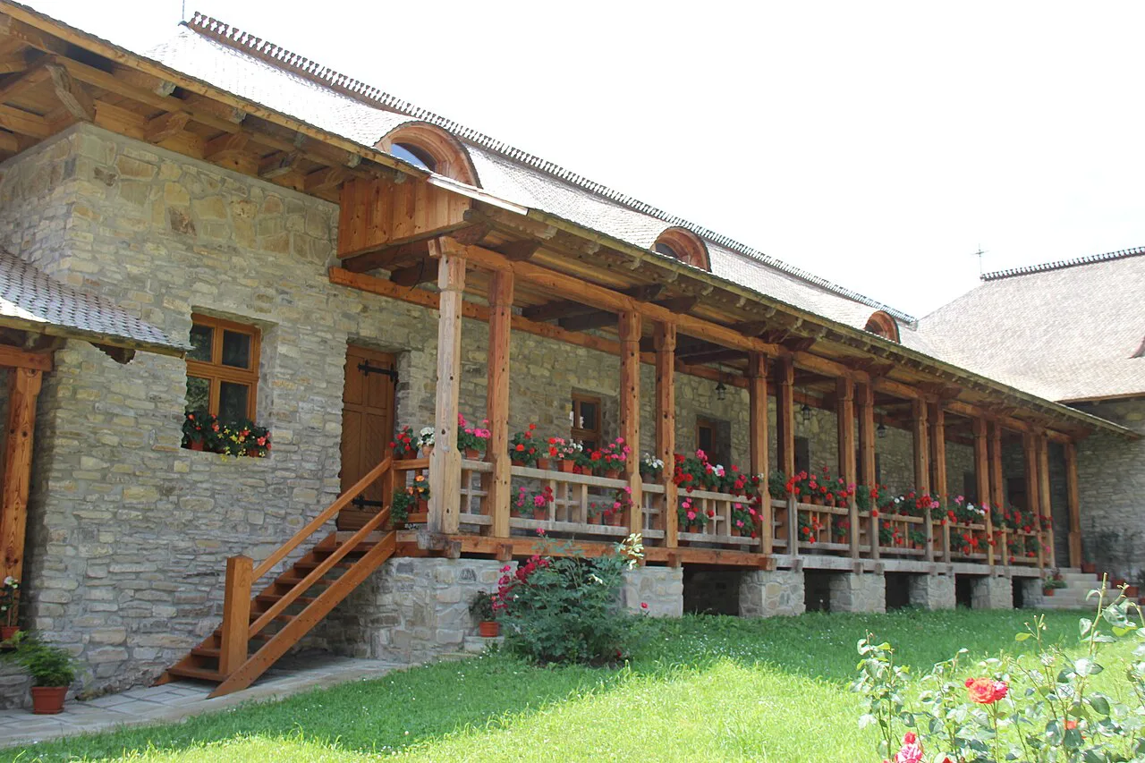 Monastic building with wooden balcony at Voroneț Monastery.
