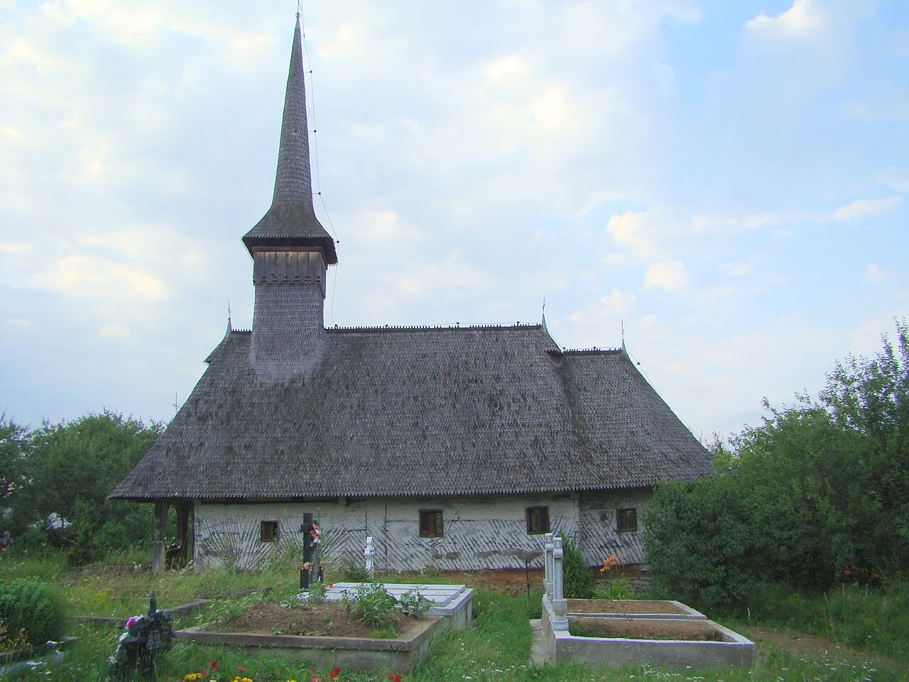Wooden church and churchyard in Culcea, Maramureș.
